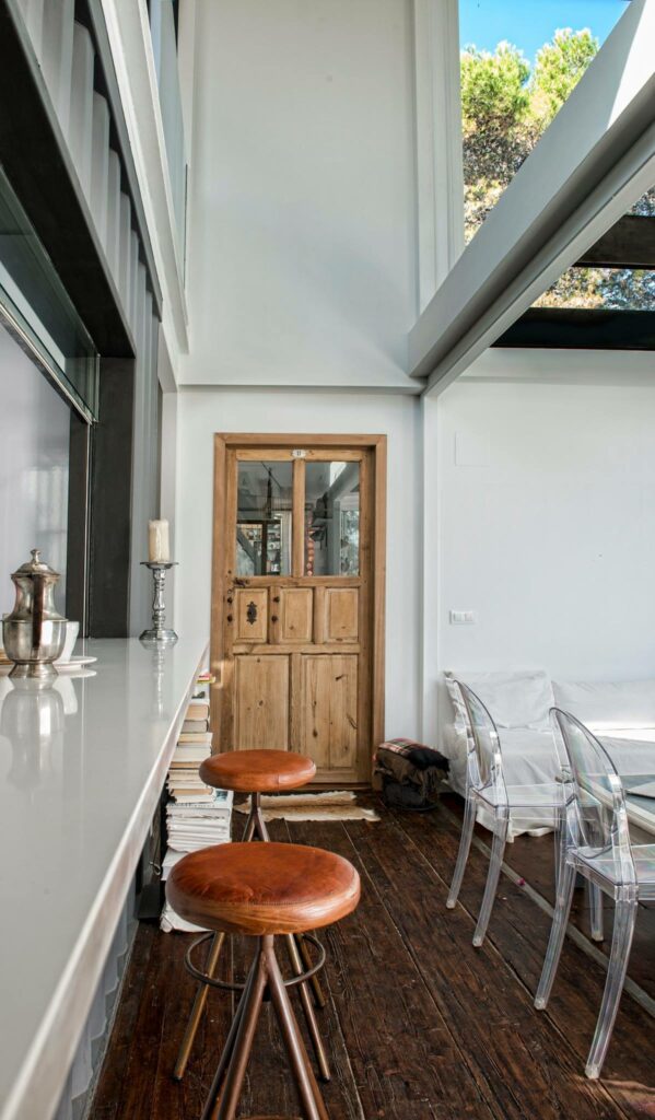 Brown stools in the kitchen bar area