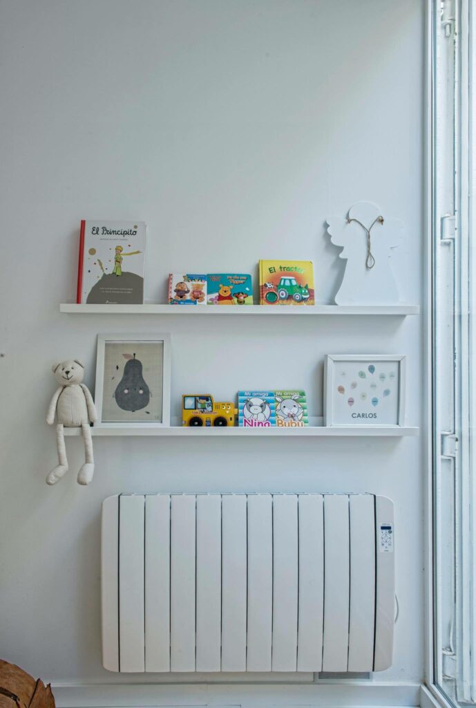 White decorative shelves with kid's toys