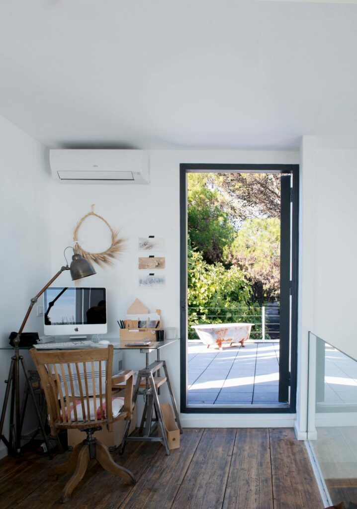 Office corner with door to the balcony